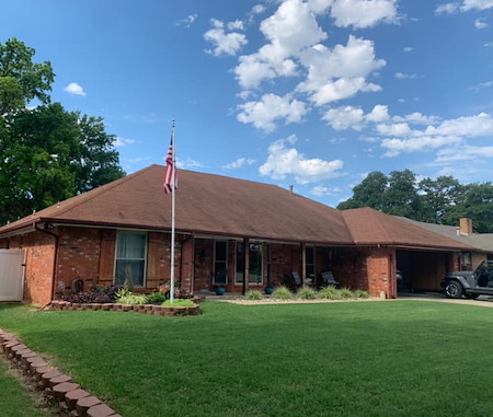 Oklahoma city roof soft washing safely removing black algae streaks without shingle damage