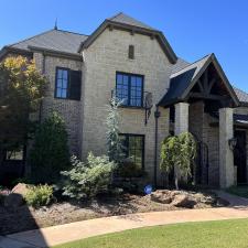 Soft washing stone house in Rose Creek Edmond 